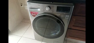 LG 2 in 1 Washer and dryer combo / WiFi with extended warranty till 2026 with Herch. In storage