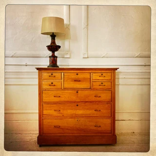 Satin wood chest of drawers on castors - R10 400