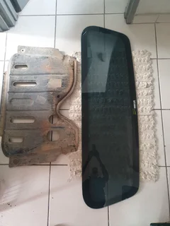 Nissan NP200 splash cover plate.Back window.