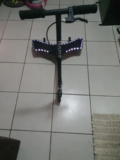 Razor scooter for sale.Only few times use by a 10 year old girl.With brakes for safety.