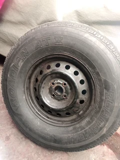 Semi off road tyre with rim