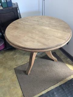 oak dining table with three chairs