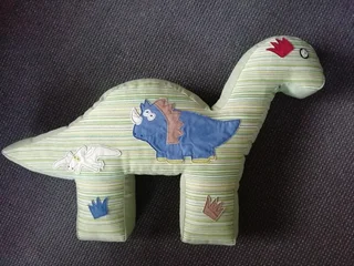 A nursing pillow and nappy stacker