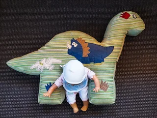 A nursing pillow and nappy stacker