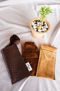 Genuine leather sun glass pouches, key holders, purses, etc.