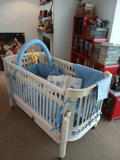 Vintage Cot with various accessories! This Cot grows with your child!