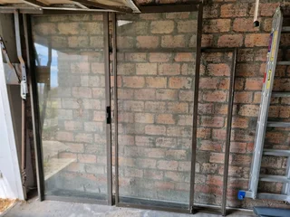 Sliding door and frame