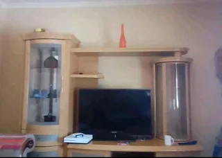 Oak finish wall unit place for big Tv