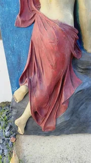 Vintage sculpture - Oread (mountain nymph) ascending rock face