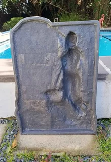 Vintage sculpture - Oread (mountain nymph) ascending rock face