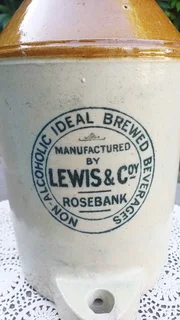 Stoneware flagon with handle. “Non-Alcoholic Ideal Brewed Beverages”. Lewis &amp; Coy
