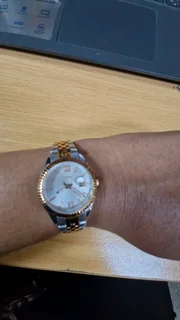 Rose gold and silver fossil watch