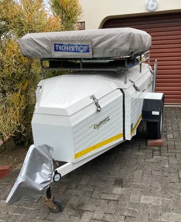 Trailer with rooftop tent