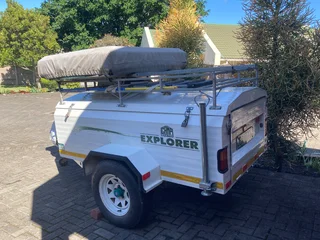 Trailer with rooftop tent