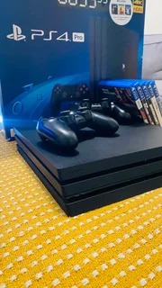 PS4 Pro 1TB + 2 original controllers + 5 games