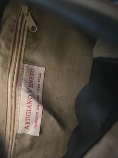 Italian leather handbag, navy with zipper.