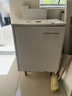 Second hand door, vanity and sink