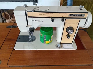 Frick sewing machine with cupboard