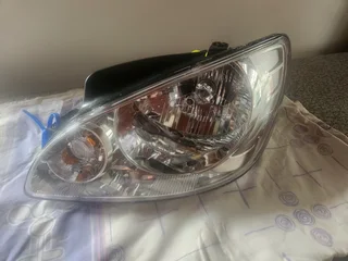 Getz left (passenger) side headlight - brand new