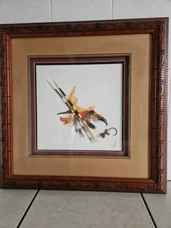 Very rare artwork using actual Pocurpine spines framed in heavy and decorated wood set in 3D