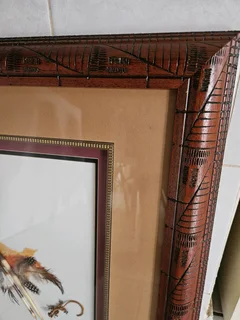 Very rare artwork using actual Pocurpine spines framed in heavy and decorated wood set in 3D