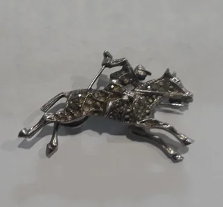 Vintage jewellery horse and jockey brooch