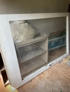 Large wood frame door with glass panel inner