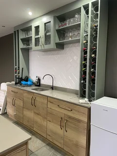 Built in bar/counter units (two) and wall unit shelving-  brand new. .