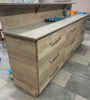 Built in bar/counter units (two) and wall unit shelving-  brand new. .