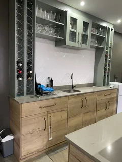 Built in bar/counter units (two) and wall unit shelving-  brand new. .