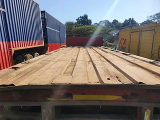 8m Henred Fruehauf DBL axel Flat Trailer