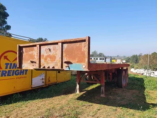 8m Henred Fruehauf DBL axel Flat Trailer