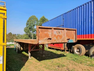 8m Henred Fruehauf DBL axel Flat Trailer