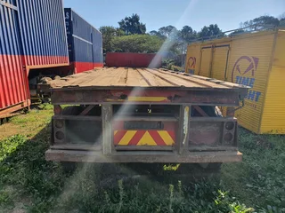 8m Henred Fruehauf DBL axel Flat Trailer