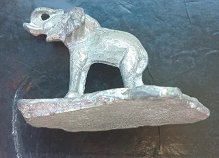 elephant-themed bottle stopper or decorative figurine