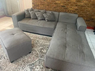 L shaped couch with Ottoman
