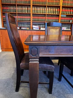 Black Walnut table with 9 leather chairs