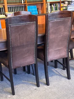 Black Walnut table with 9 leather chairs