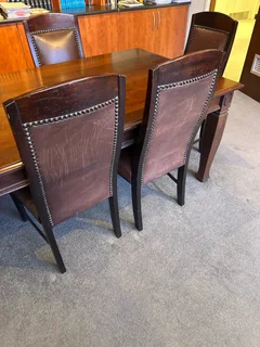 Black Walnut table with 9 leather chairs