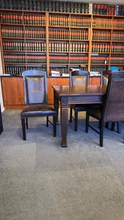 Black Walnut table with 9 leather chairs