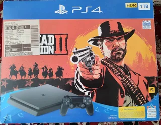 PS4 Slim 1TB, 2xControllers and 3xGames