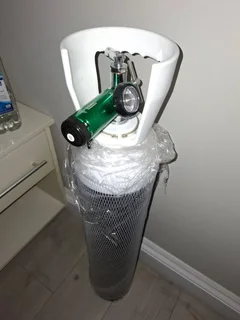 Oxygen cylinder with regulator used once in an emergency, no longer needed!