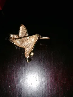 Swarovski crystal-embellished brooches