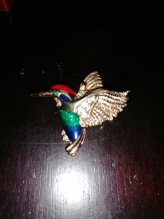 Swarovski crystal-embellished brooches