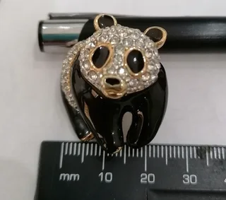 Swarovski crystal-embellished brooches