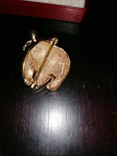 Swarovski crystal-embellished brooches