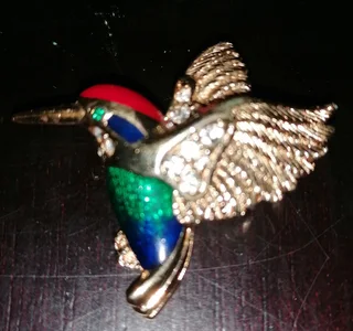 Swarovski crystal-embellished brooches