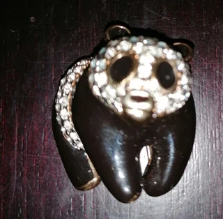 Swarovski crystal-embellished brooches