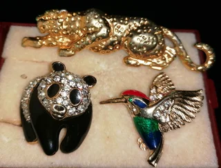 Swarovski crystal-embellished brooches