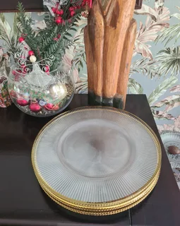 Gold rimmed glass charger plates